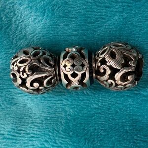 Three Brighton charms with fancy, scroll design, all new